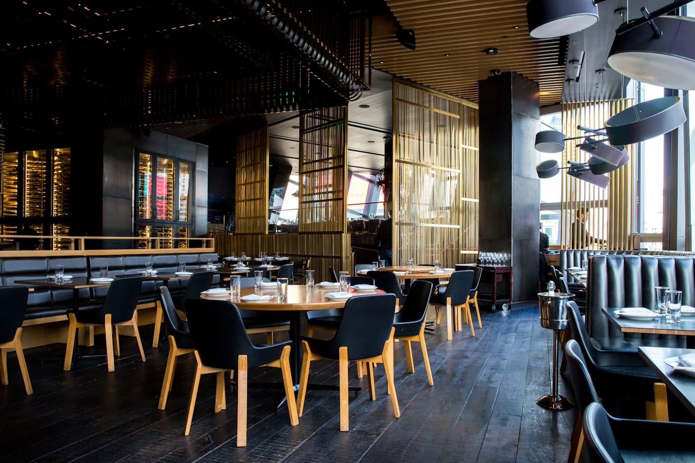 Modern restaurant dining room with warm ambient lighting